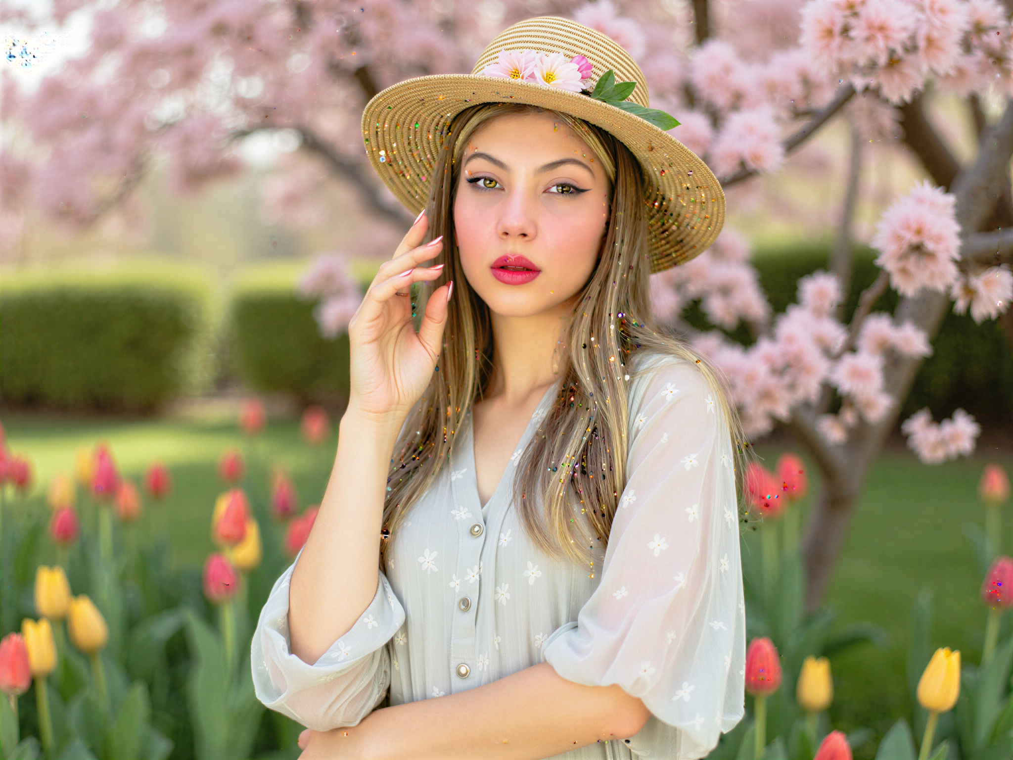 A joyful female subject, OD62S, aged 28, embodies the essence of Easter in a charming outdoor setting. She wears a delicate pastel-colored chiffon sundress adorned with floral patterns, complemented by a wide-brimmed straw hat adorned with fresh spring blooms. Her radiant smile captures the spirit of happiness and renewal that defines the season. The background features a picturesque garden scene with blooming cherry blossoms and vibrant tulips, enhanced by soft, natural sunlight filtering through the leaves. The composition conveys warmth and joy, inviting a sense of celebration and tranquility reminiscent of an Easter gathering, captured in a bright, photorealistic style.